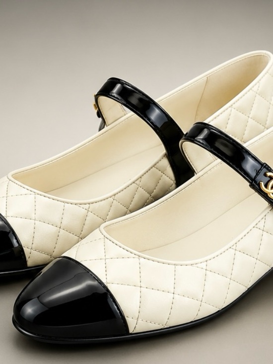 CHANEL Shoes - CHANEL Cream Quilted Mary Jane Flats with Black Patent Cap Toe